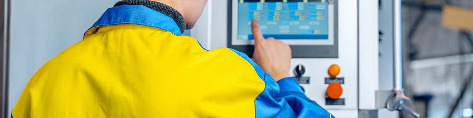 Worker in a plant checking inventory supply chain agility on the OptiPoint inventory management software module